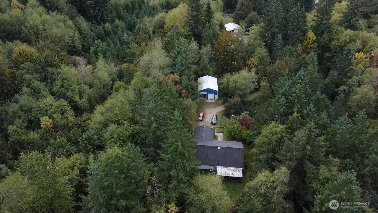 13920 Littlerock Road Southwest Rochester, WA 98579 - Photo 2 of 23 an aerial view of a house with a yard