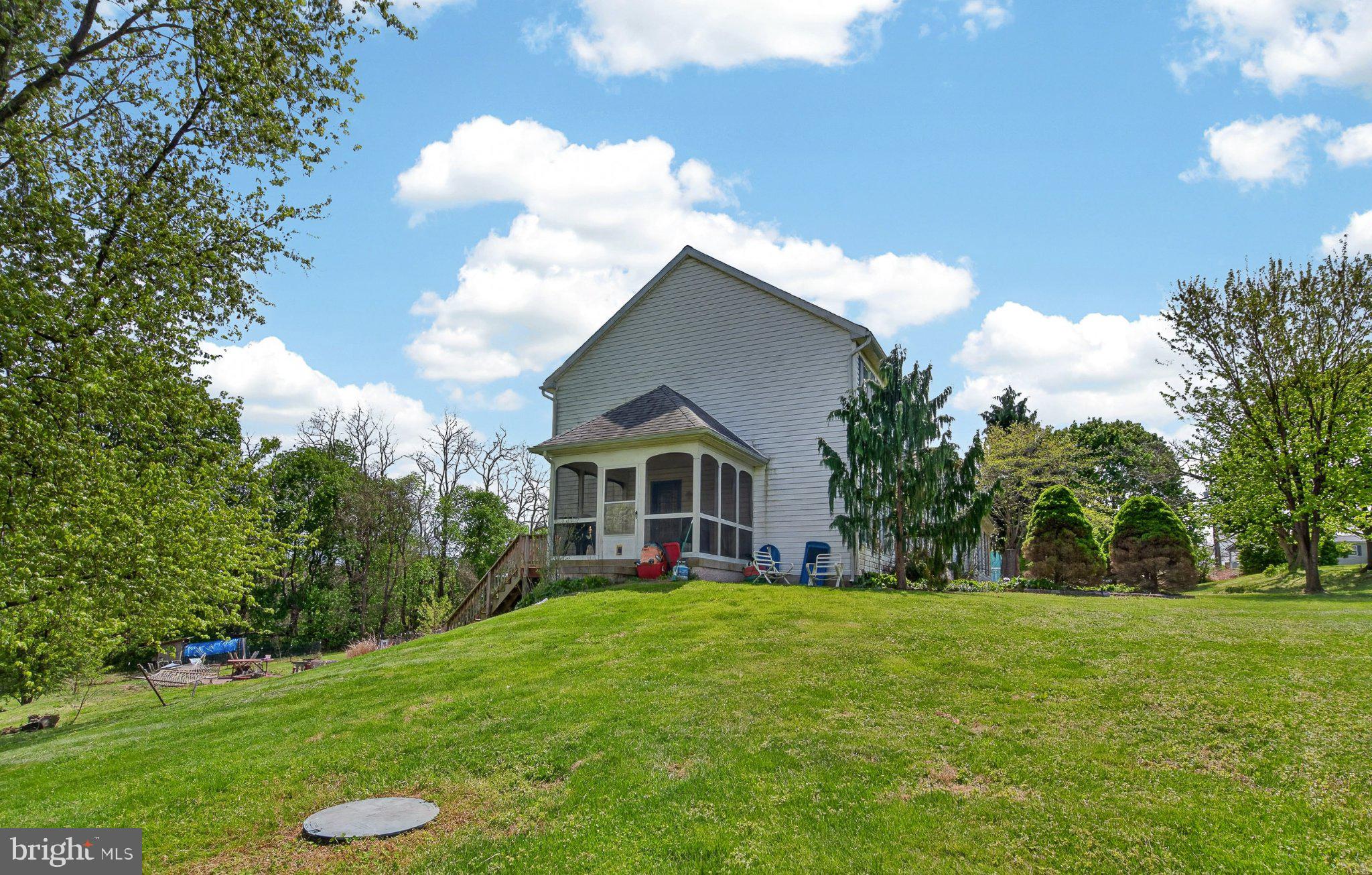 45 Latham Road Nottingham, PA 19362 - Photo 52 of 83 Charming hillside home with lush greenery.