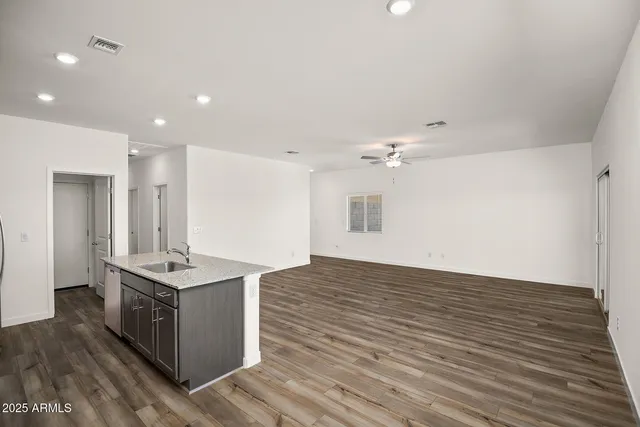 a view of kitchen island wooden floor