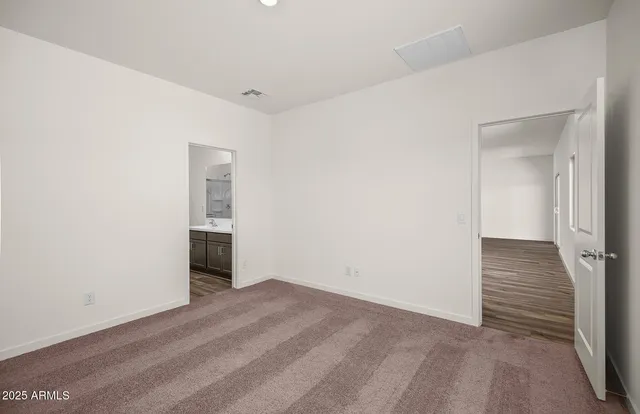 a view of a room with a hallway