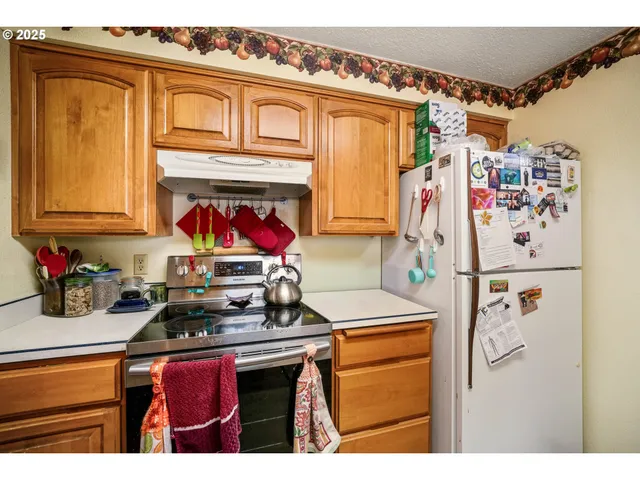 a bathroom with a sink toilet tub and shower