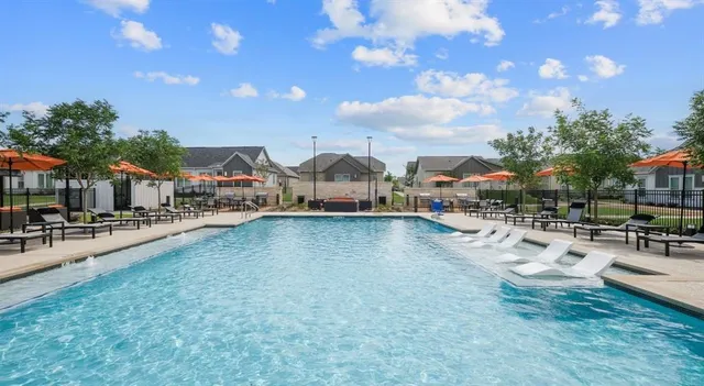 a city view with houses and a lake view