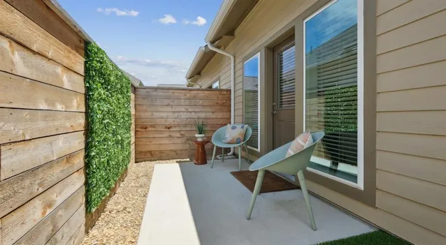 a view of a chairs in a balcony