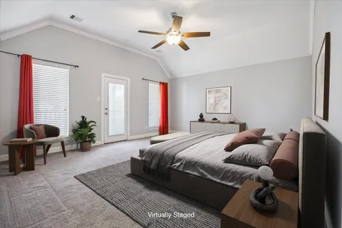 a bedroom with a bed and furniture