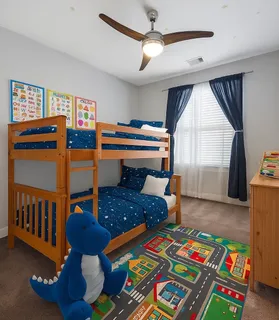 a bedroom with furniture and a window