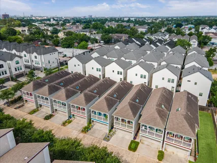 an aerial view of a swimming pool and mountain view