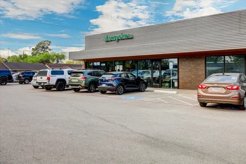 a car parked in front of a building