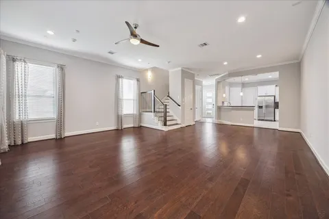 a view of a kitchen with a sink and a window