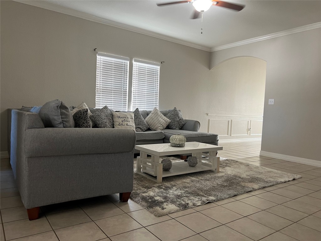 10902 Seneca Street Houston, TX 77016 - Photo 2 of 14 a living room with furniture and a couch