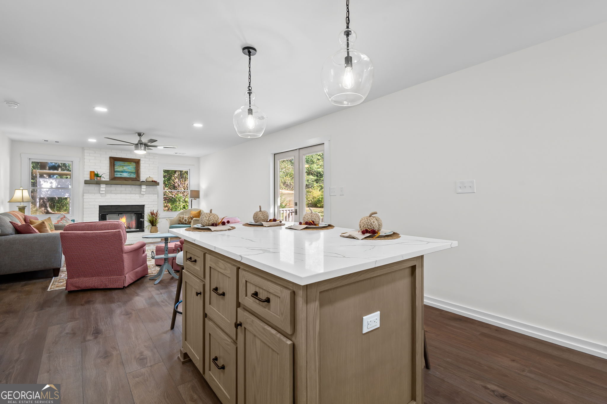 85 Franklin Road Newnan, GA 30263 - Photo 11 of 37 a kitchen with stainless steel appliances granite countertop a sink stove and wooden floor