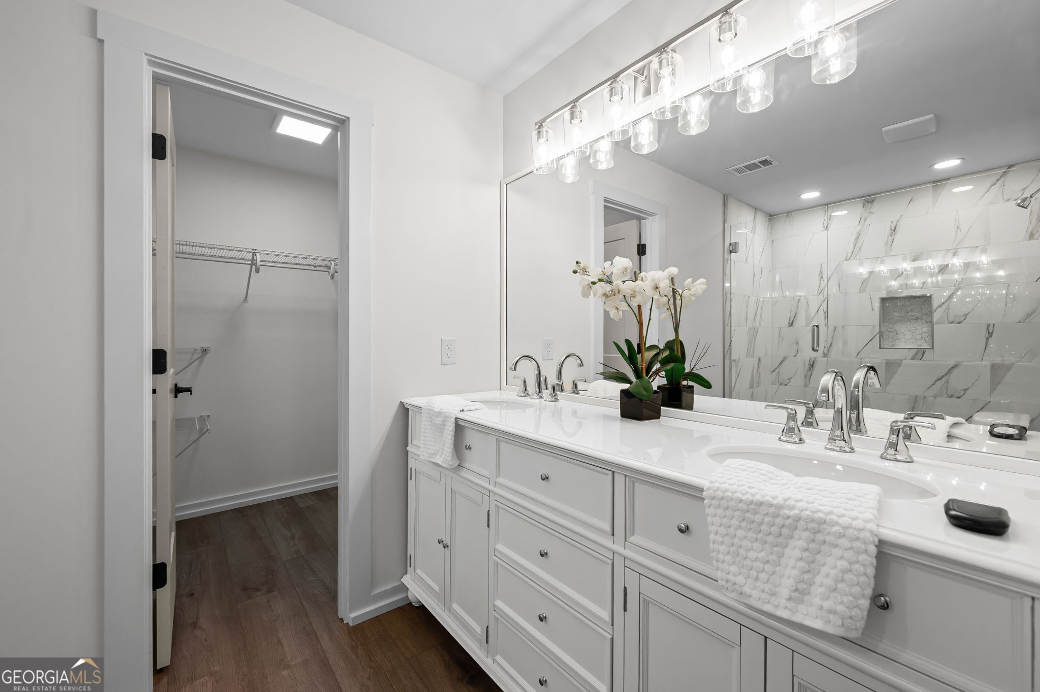 85 Franklin Road Newnan, GA 30263 - Photo 23 of 37 a bathroom with a double vanity sink mirror and shower