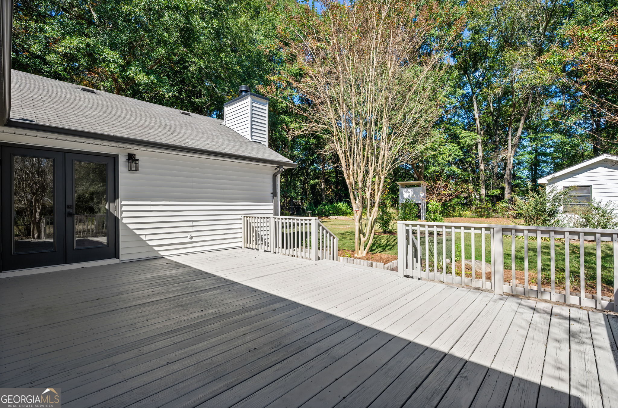 85 Franklin Road Newnan, GA 30263 - Photo 30 of 37 a balcony with wooden floor and fence