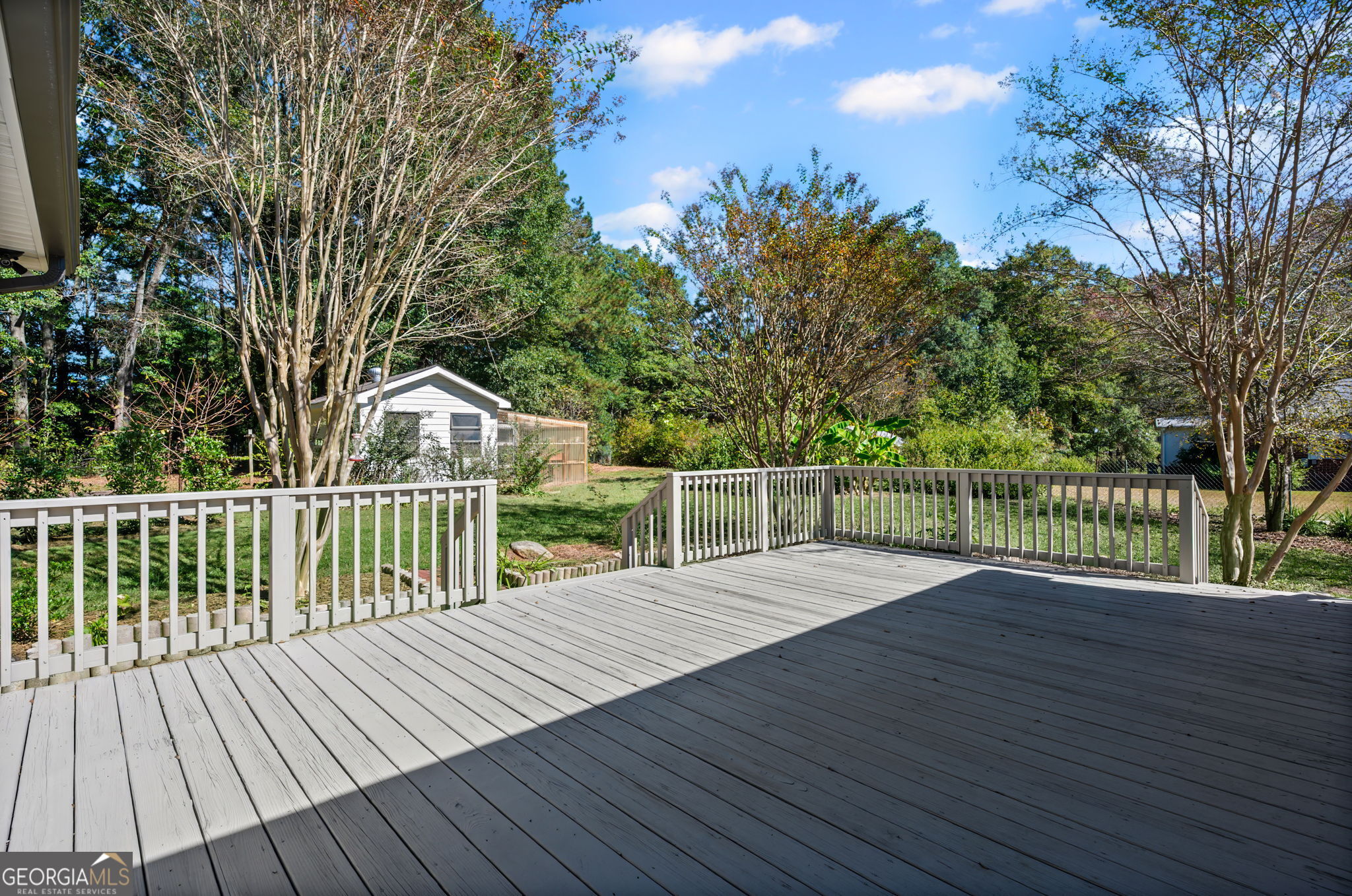 85 Franklin Road Newnan, GA 30263 - Photo 31 of 37 a view of balcony with wooden floor and fence