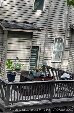 a view of a house with porch and wooden floor