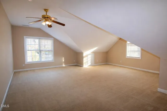 a close view of a sink and a stove in the kitchen