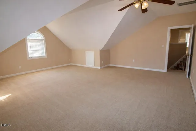 a room with a door and a table