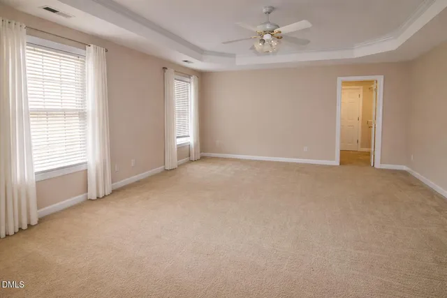 a bathroom with a double vanity sink toilet and shower