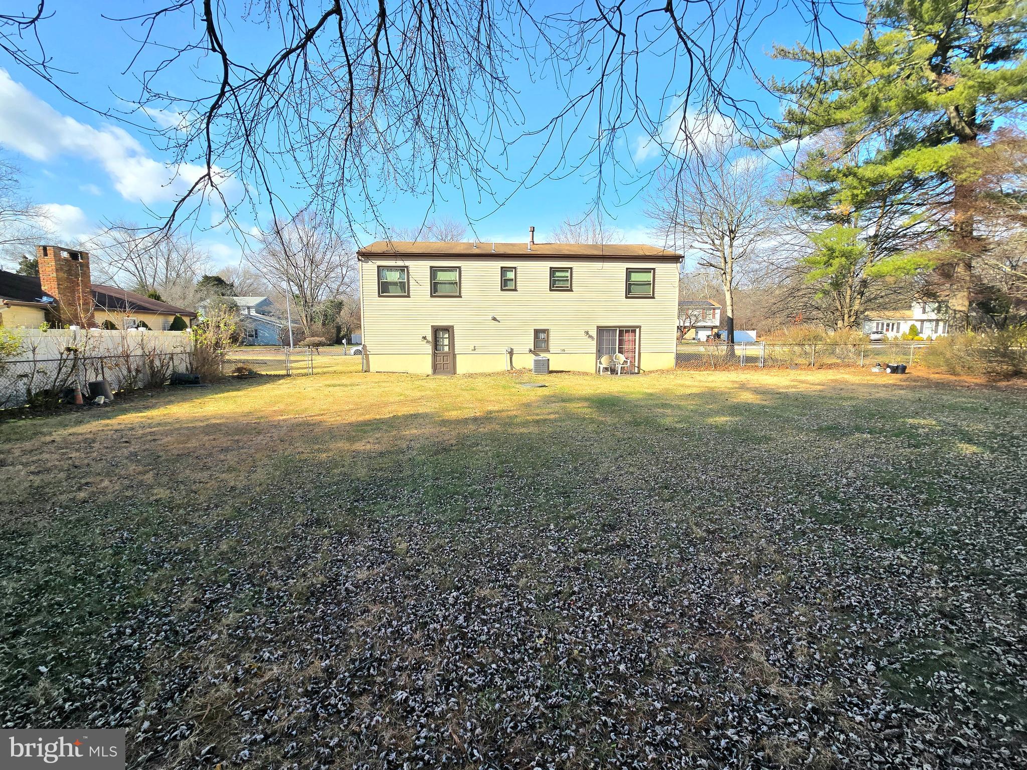 23 Dunham Loop Berlin, NJ 08009 - Photo 15 of 16 a view of a yard with a house