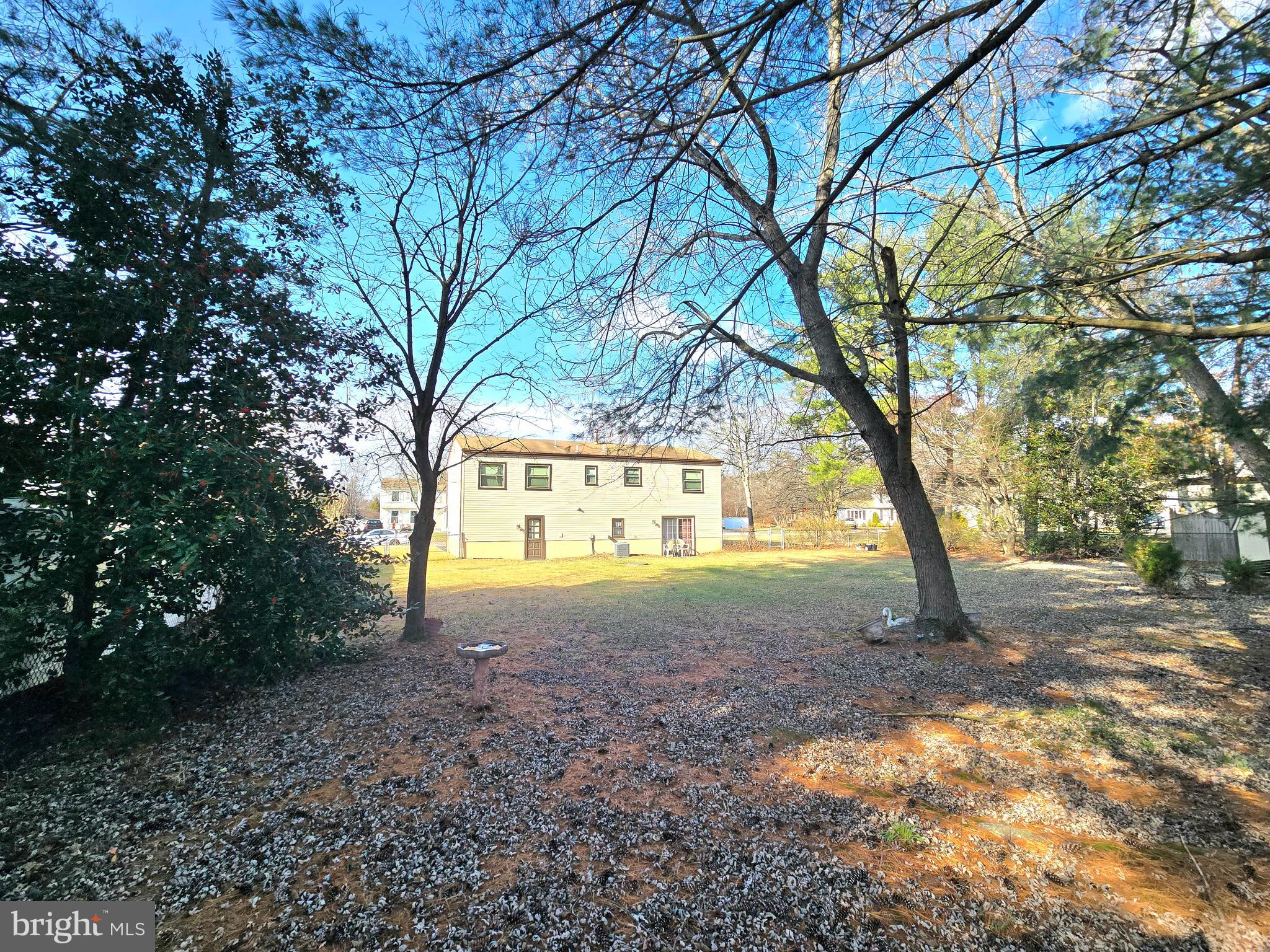 23 Dunham Loop Berlin, NJ 08009 - Photo 16 of 16 a view of a yard with large trees
