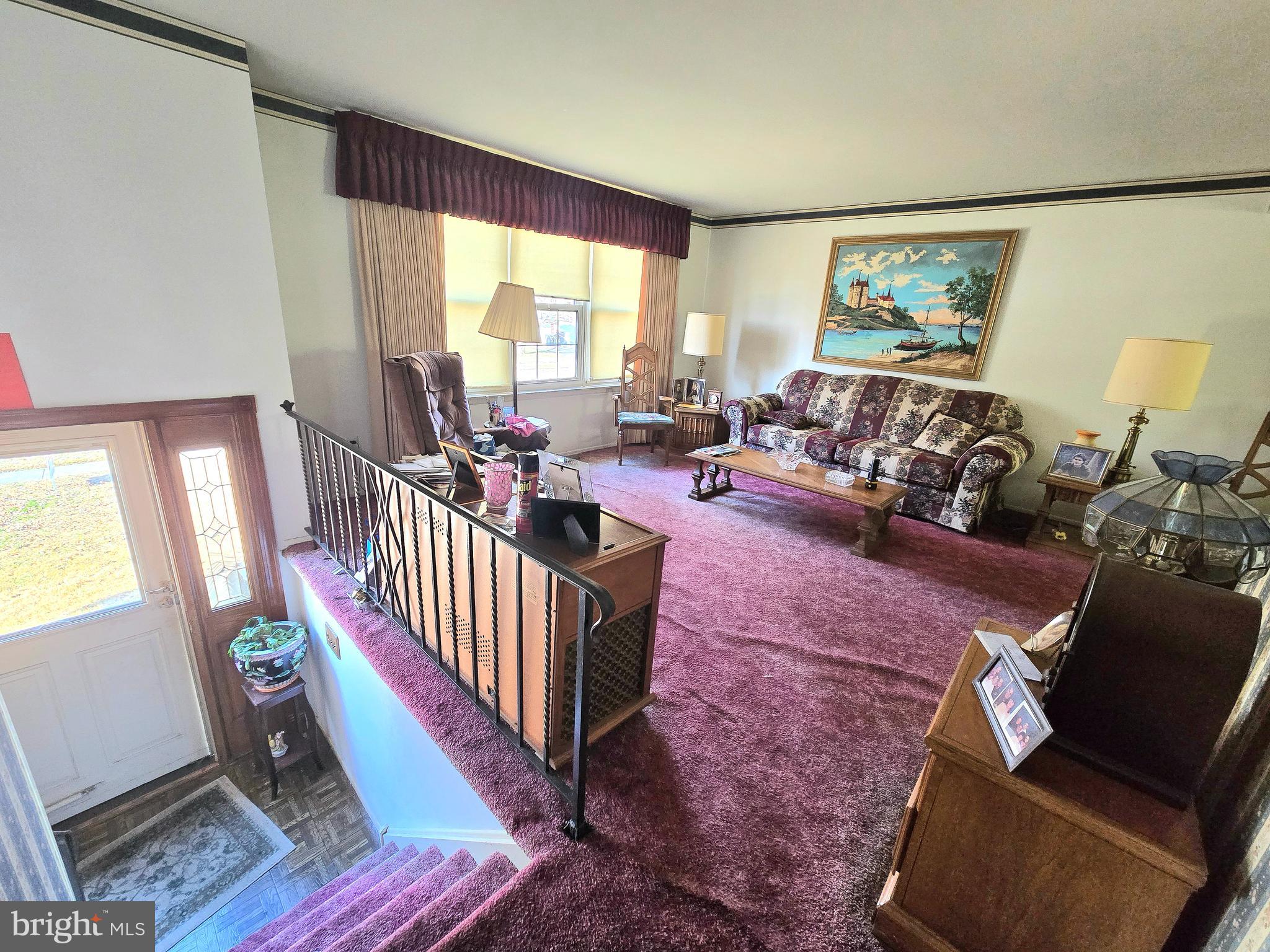 23 Dunham Loop Berlin, NJ 08009 - Photo 4 of 16 a living room with furniture and a large window