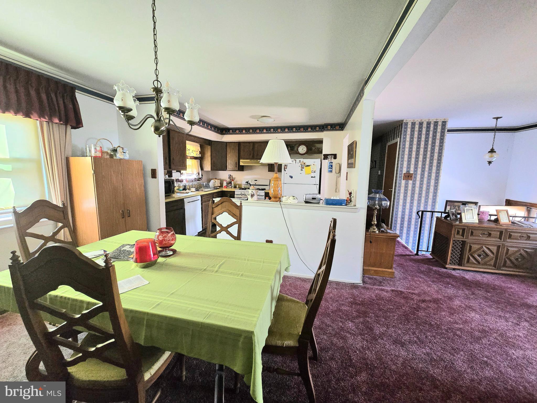 23 Dunham Loop Berlin, NJ 08009 - Photo 5 of 16 a view of a dining room with furniture window and wooden floor