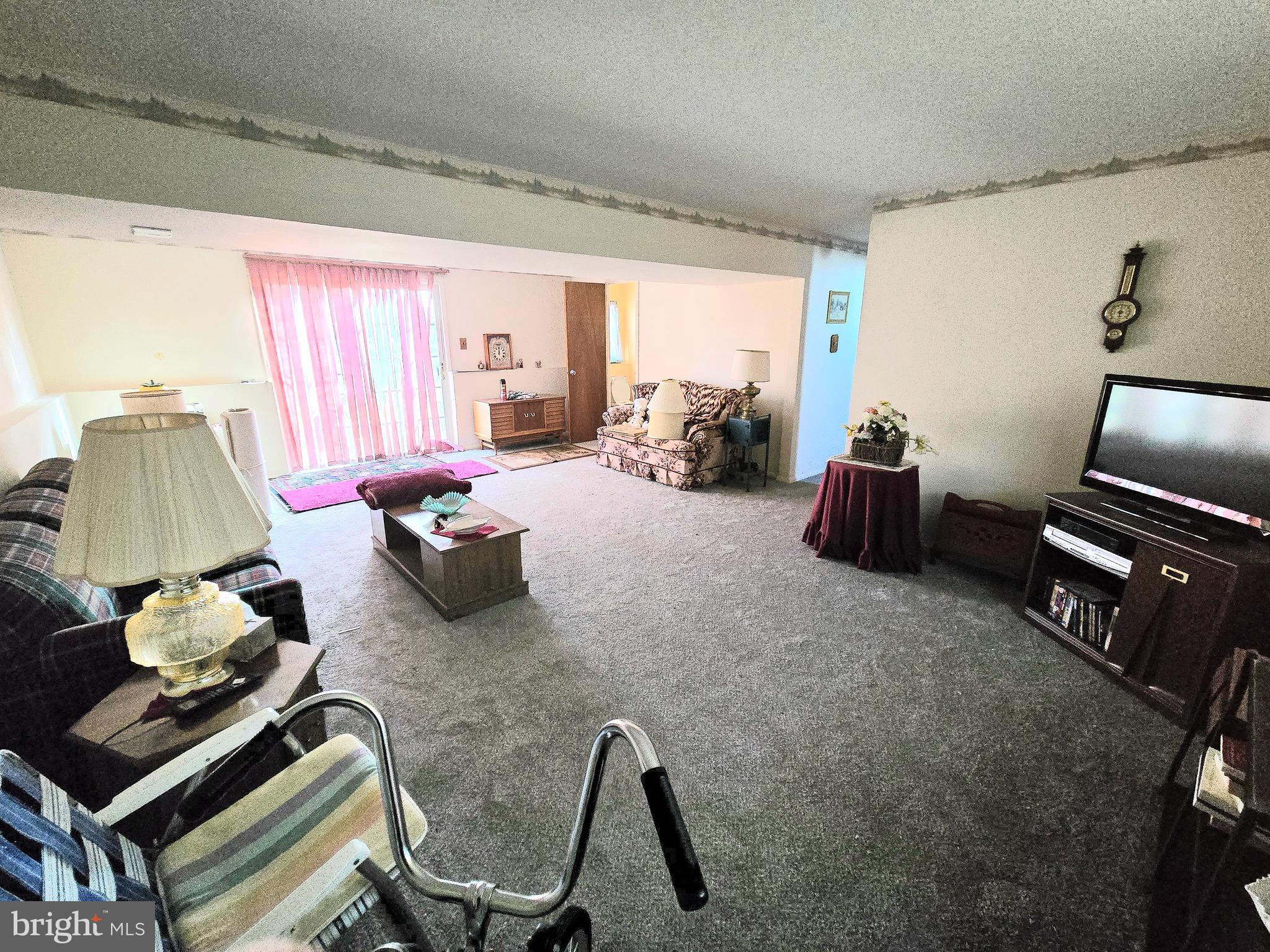 23 Dunham Loop Berlin, NJ 08009 - Photo 8 of 16 a room with furniture and a window