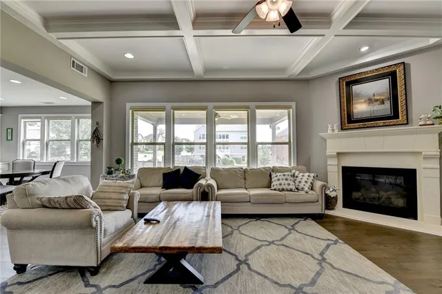 a view of a a dining room with furniture window and outside view