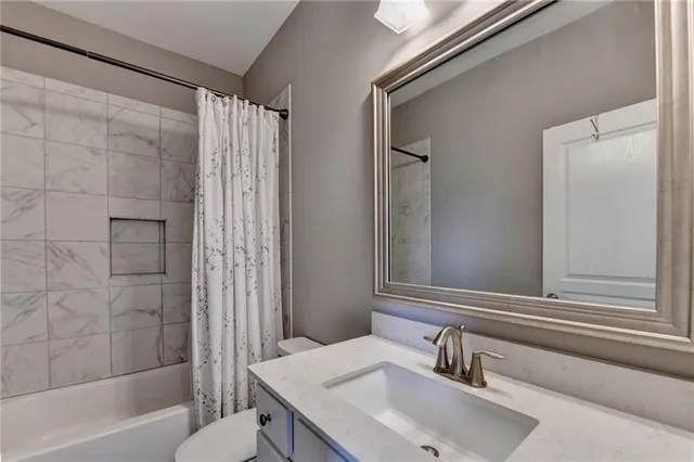 a view of a garden with large trees