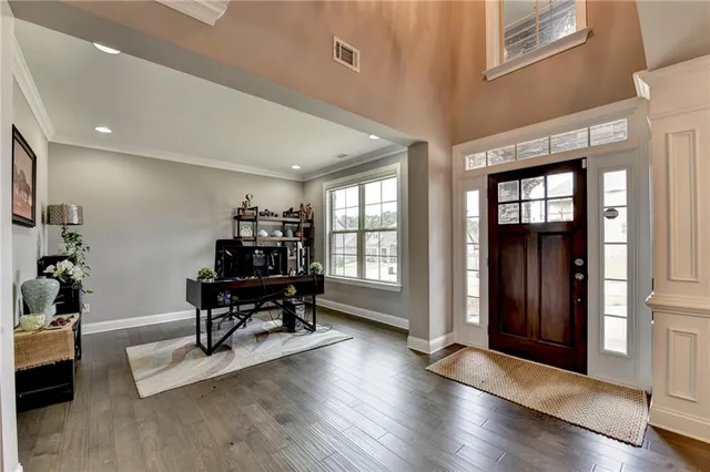 a workspace with furniture and window