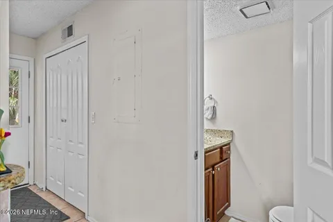 a kitchen with stainless steel appliances granite countertop a stove and a microwave