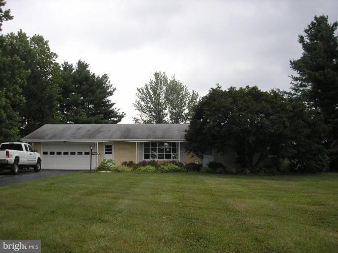 12915 Penn Shop Road Mount Airy, MD 21771 - Photo 1 of 3 a view of house with outdoor space and garden