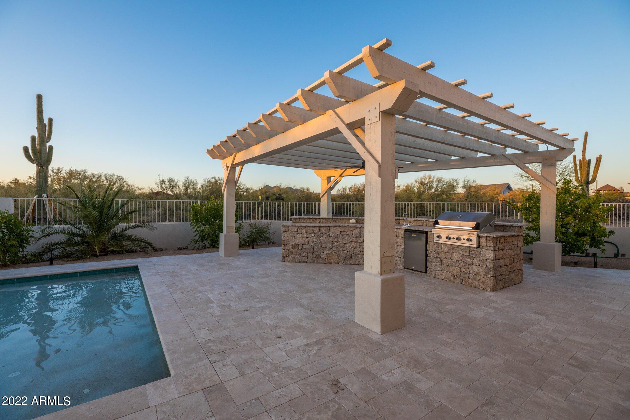 31223 East Ranch Road Cave Creek, AZ 85331 - Photo 64 of 82 Travertine pavers pool surround