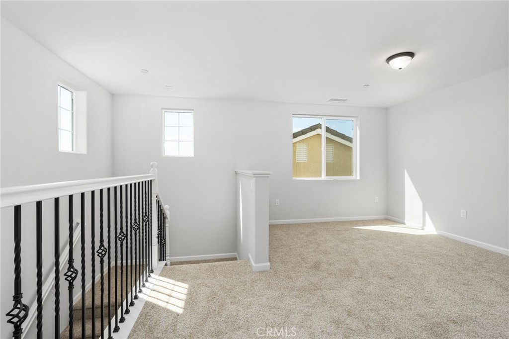 1266 Talus Way South Madera, CA 93636 - Photo 24 of 43 an empty room with windows