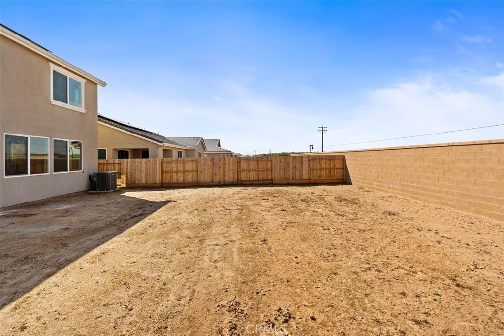 1266 Talus Way South Madera, CA 93636 - Photo 43 of 43 a view of a house with a backyard