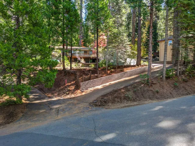 a view of a street with sitting area