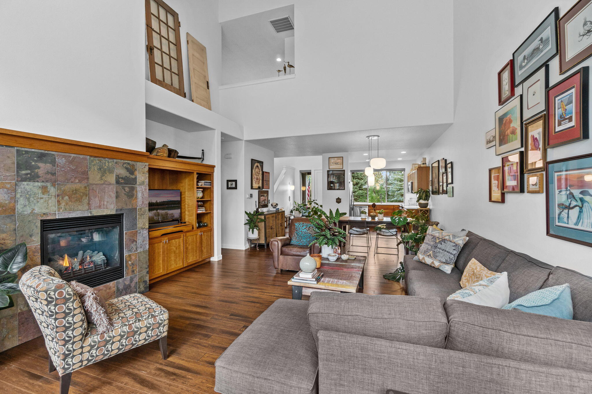 10942 Village Loop Redmond, OR 97756 - Photo 30 of 45 a living room with furniture and a fireplace