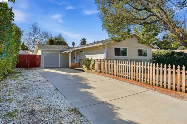 a front view of a house having yard