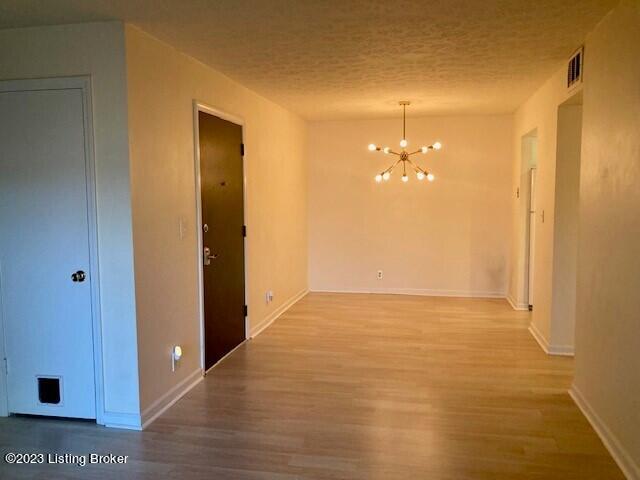 4026 Poplar Level Road, Unit 7 Louisville, KY 40213 - Photo 17 of 46 Dining area with chandelier.