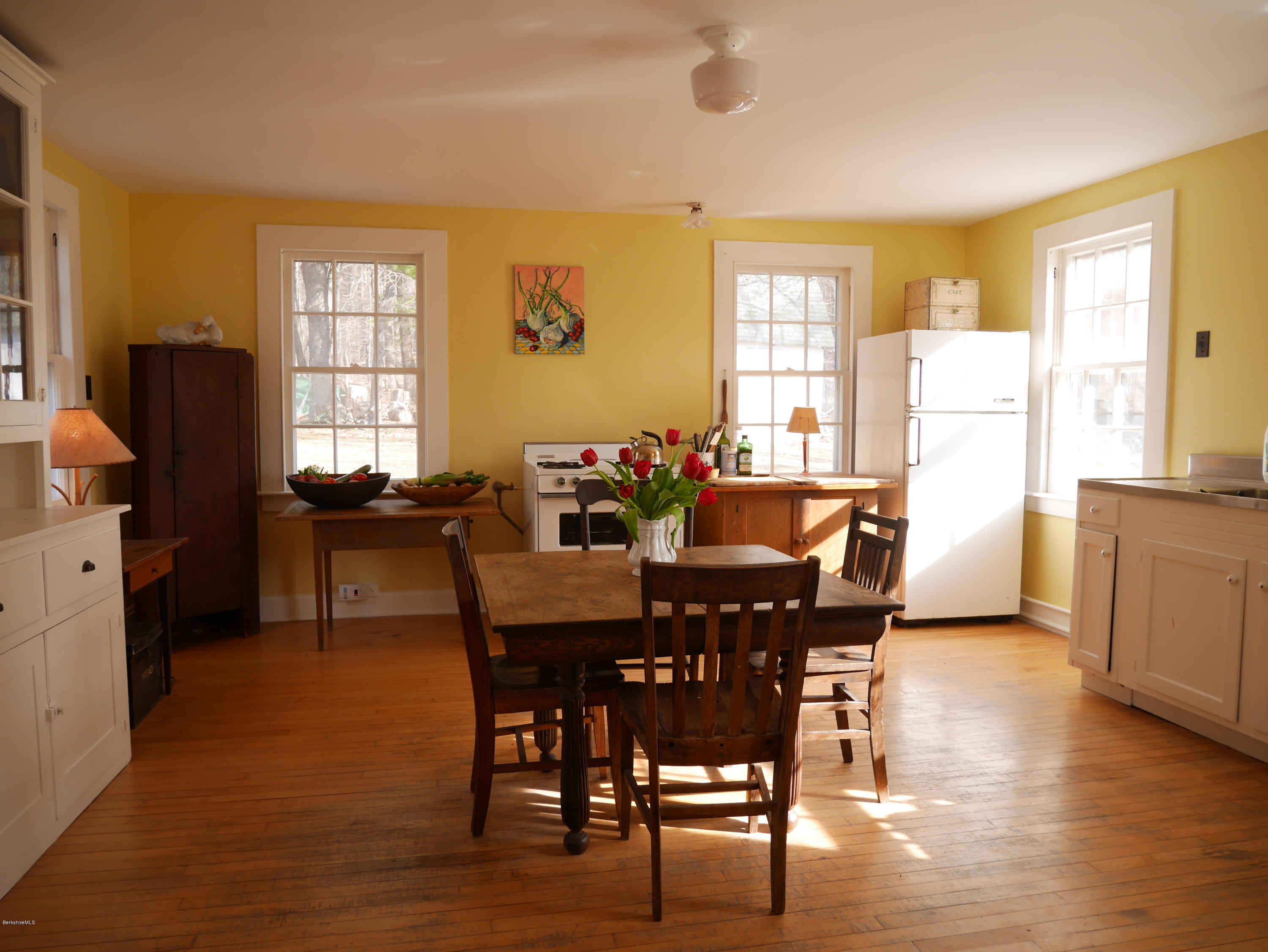40 Cronk Road Sandisfield, MA 01255 - Photo 4 of 10 a view of a dining room with furniture and wooden floor