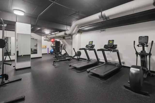 a view of a room with gym equipment