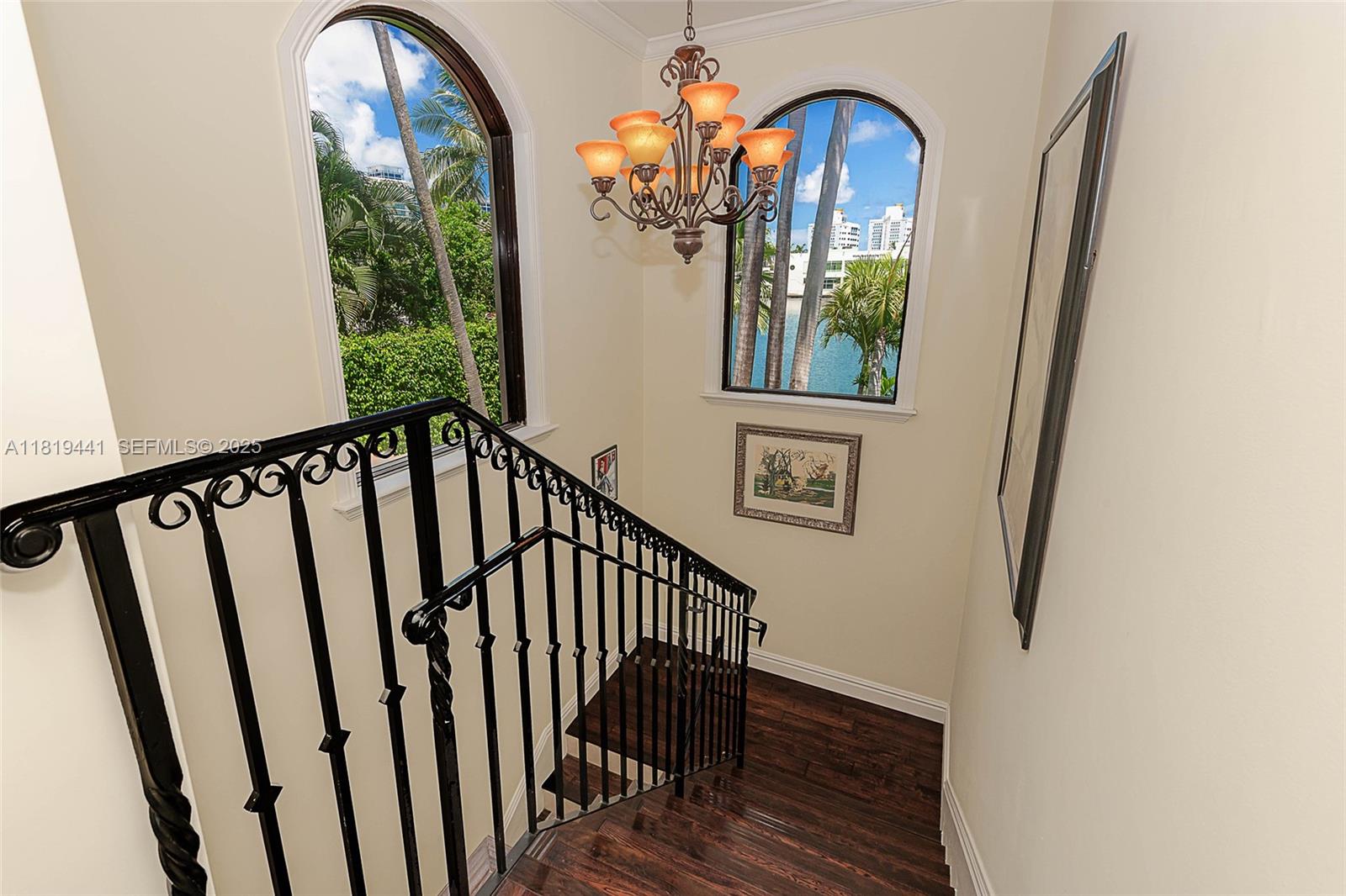 6535 Allison Road Miami Beach, FL 33141 - Photo 18 of 60 a view of a entryway door with wooden floor