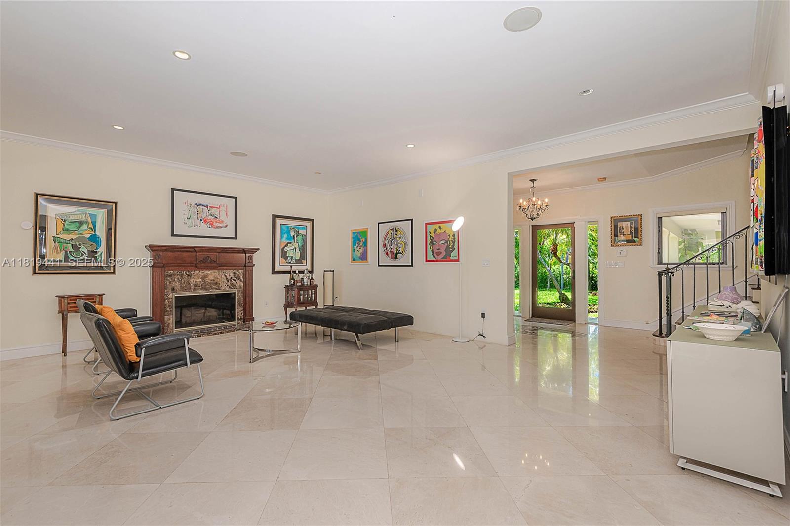 6535 Allison Road Miami Beach, FL 33141 - Photo 21 of 60 a living room with furniture and a fireplace