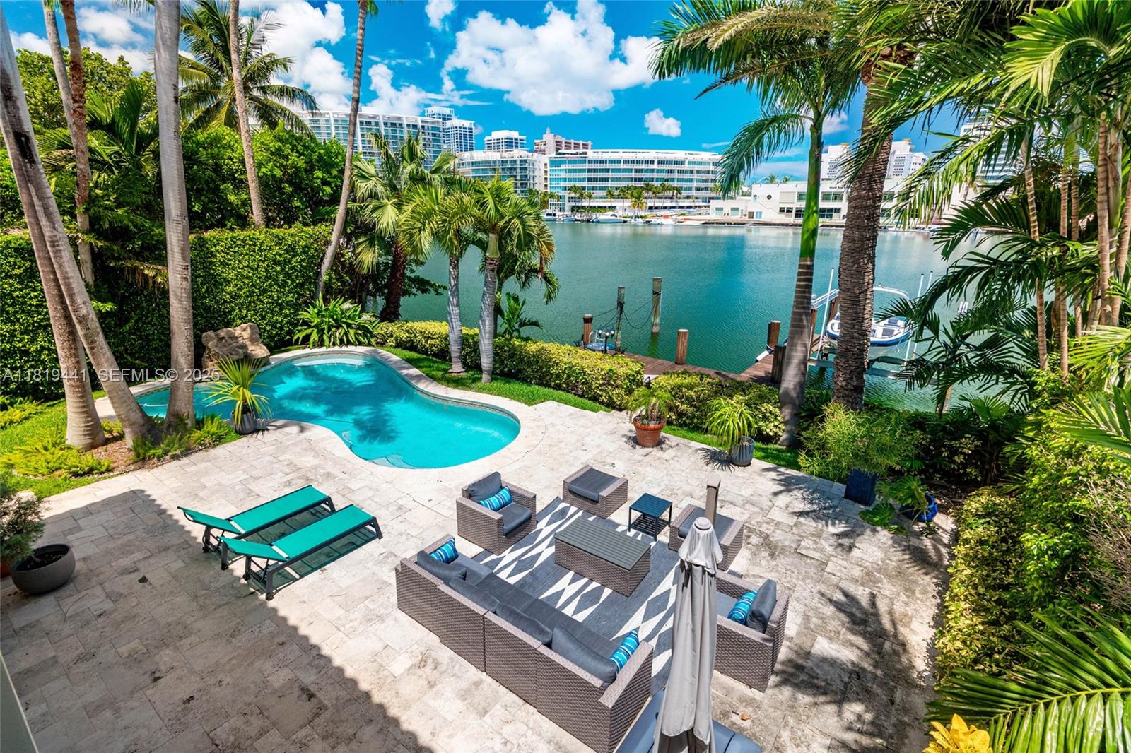 6535 Allison Road Miami Beach, FL 33141 - Photo 4 of 60 a view of a backyard with plants and outdoor seating