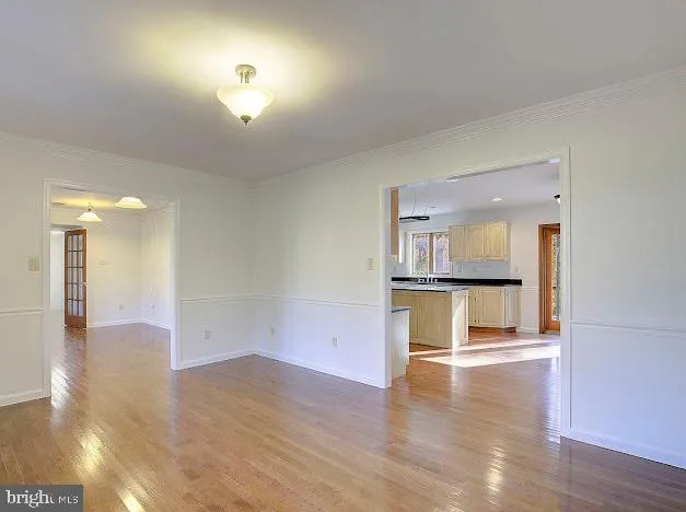 a view of a kitchen cabinets and wooden floor