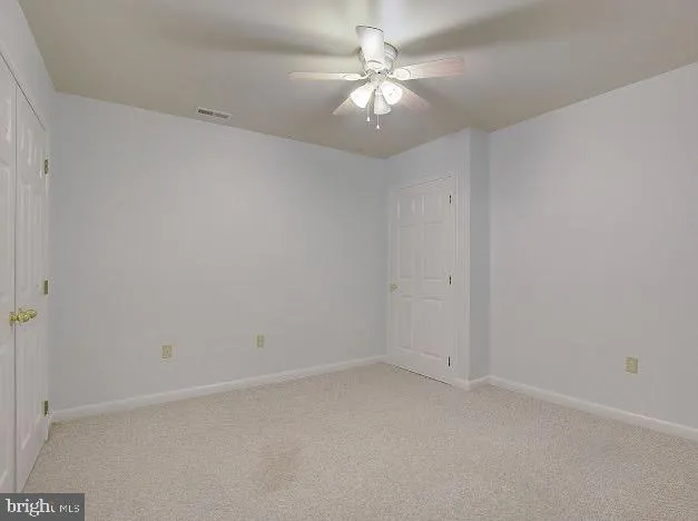 a view of balcony with wooden floor and fence