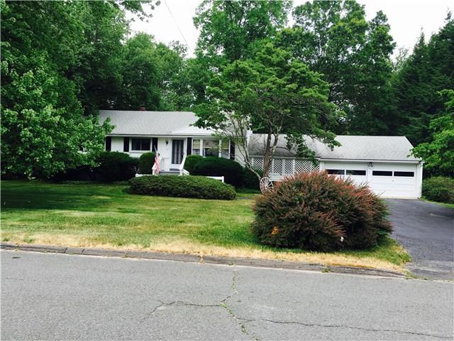 56 Meadow Road Trumbull, CT 06611 - Photo 1 of 1 a front view of a house with a garden