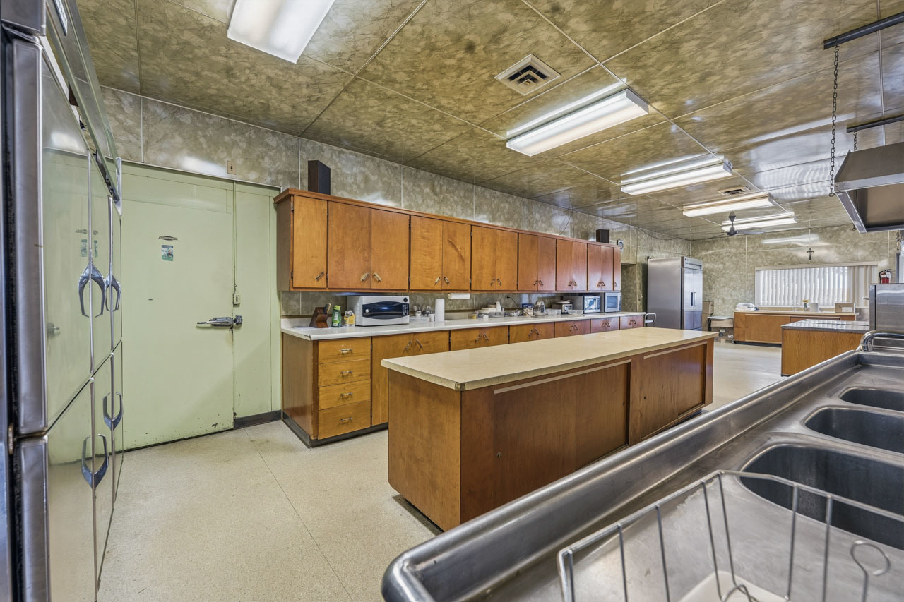 10330 336th Avenue Randall, WI 53181 - Photo 15 of 29 a kitchen with stainless steel appliances granite countertop a sink and cabinets