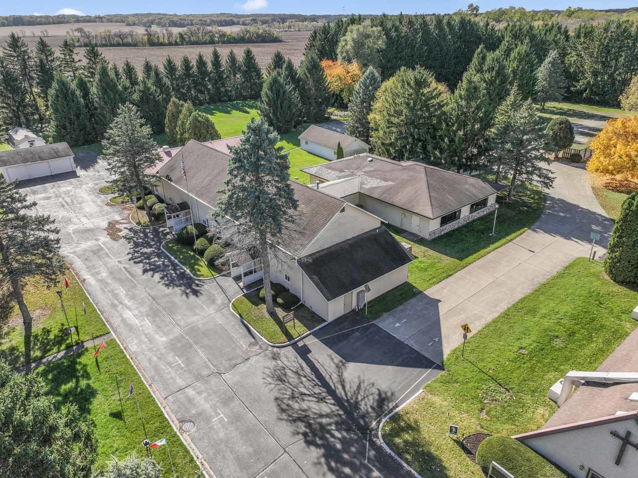 10330 336th Avenue Randall, WI 53181 - Photo 17 of 29 an aerial view of a house with backyard swimming pool and outdoor seating