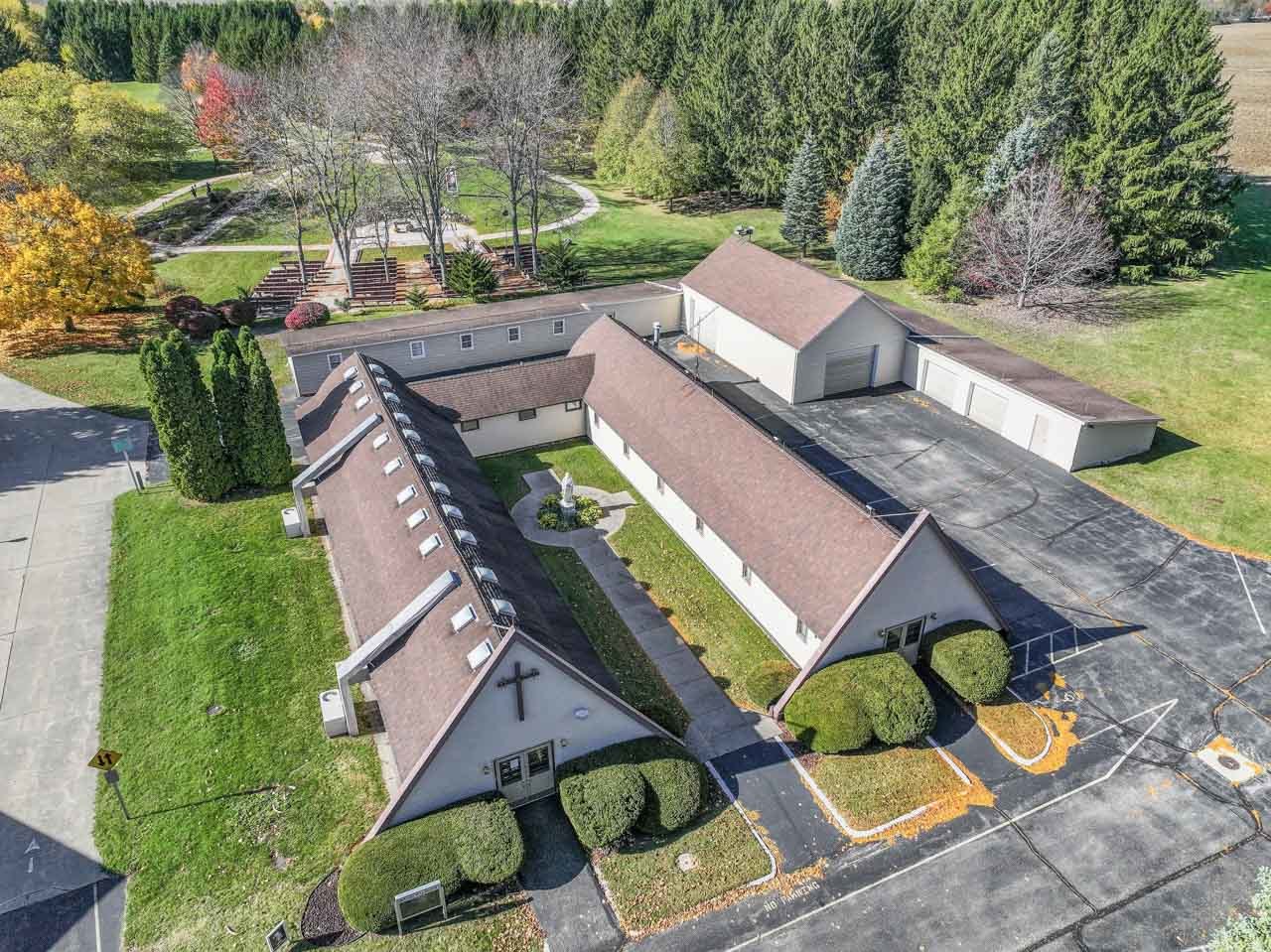 10330 336th Avenue Randall, WI 53181 - Photo 18 of 29 an aerial view of a house with garden space and street view
