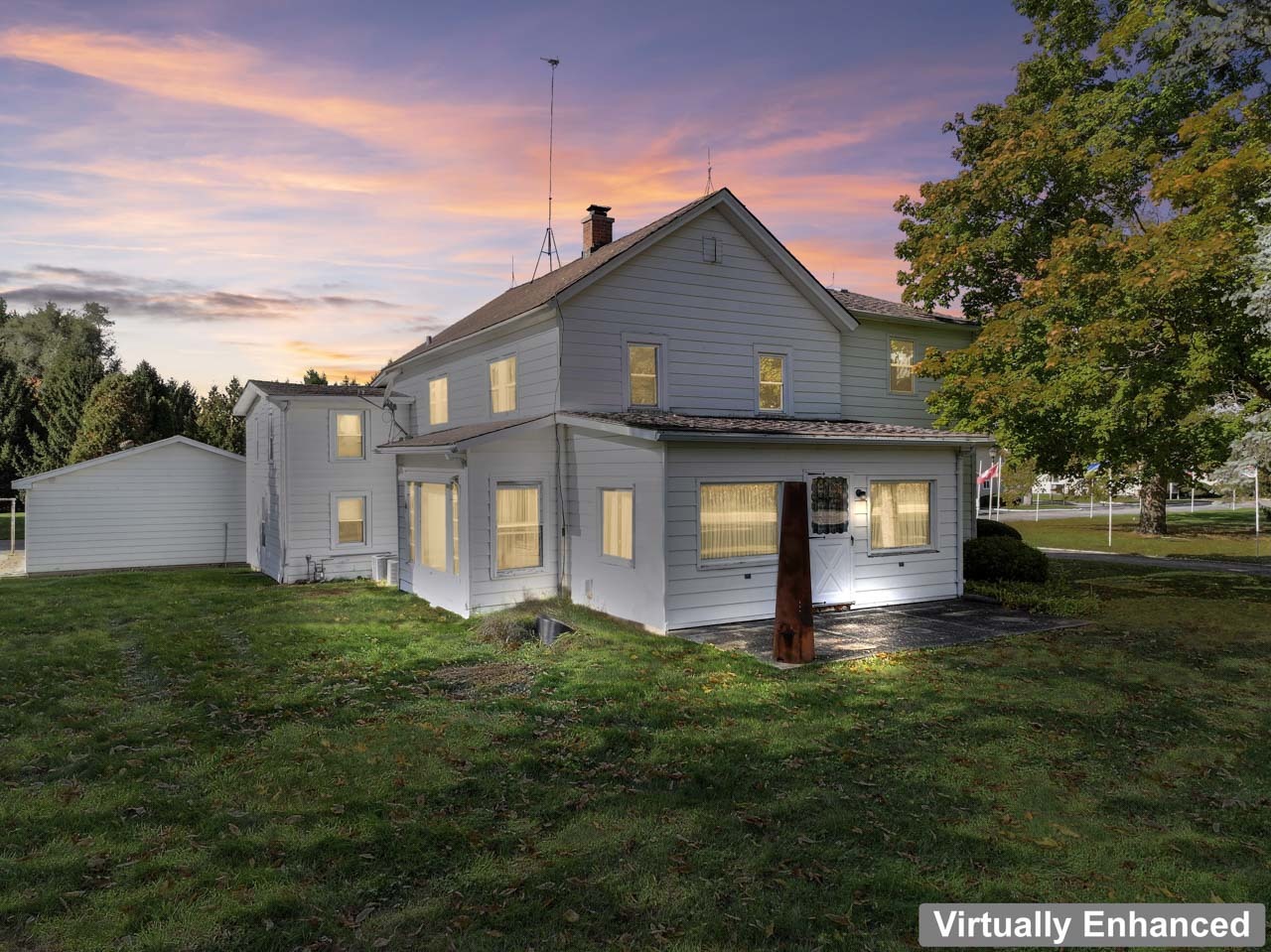 10330 336th Avenue Randall, WI 53181 - Photo 4 of 29 a front view of a house with a yard